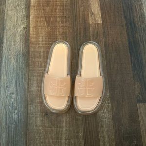 Tory Burch Pink Logo Embossed Bubble Jellies. 
Perfect for summer fun.